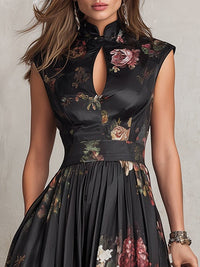 Violetta - Robe midi noire en satin plissé à motif floral et encolure à trou de serrure